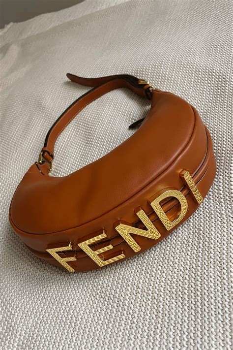 fendi bracelet dhgate|fendi pants.